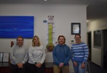 Services work to distribute hampers