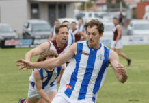 Team effort puts City back on top