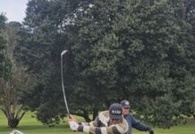 Murray swings to top