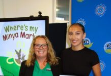 Former student showcases book at school