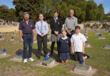 Students help lay flags for Anzac Day