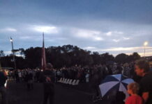 Crowd gathers to remember