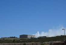 Shed in flames at dump