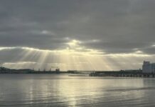 Sunbeams over ship