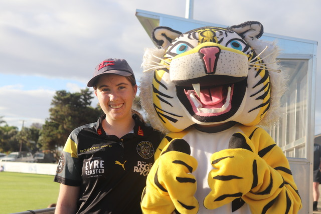 Grand smiles at footy final