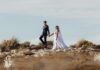 Bride and groom by the bay