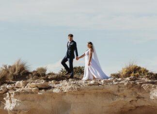 Bride and groom by the bay