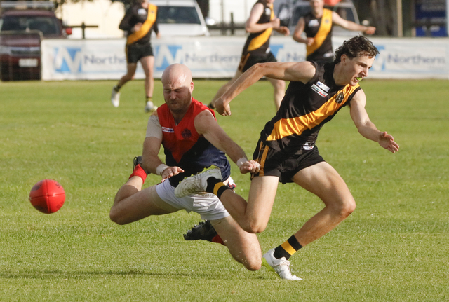 Demons dial in to down Tigers